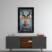 Human Deer glass wall art styled above a console in a foyer