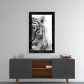 Tiger glass wall art styled above a console in a reading nook