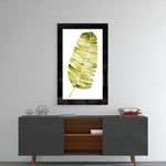 Leaf glass wall art styled above a console in a reading nook