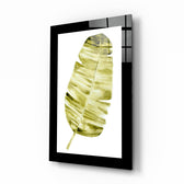 Leaf glass wall art displayed above a bed in a bedroom