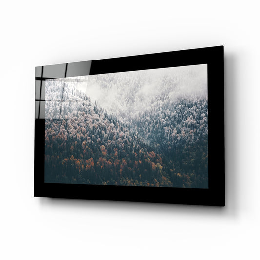 Forest glass wall art displayed above a sideboard in a study