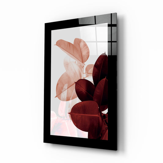 Leaves glass wall art displayed above a bed in a bedroom