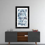 Blue Lines glass wall art styled above a console in a home office