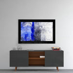 Abstract Blue glass wall art styled above a console in a foyer