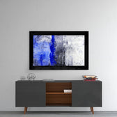 Abstract Blue glass wall art styled above a console in a foyer